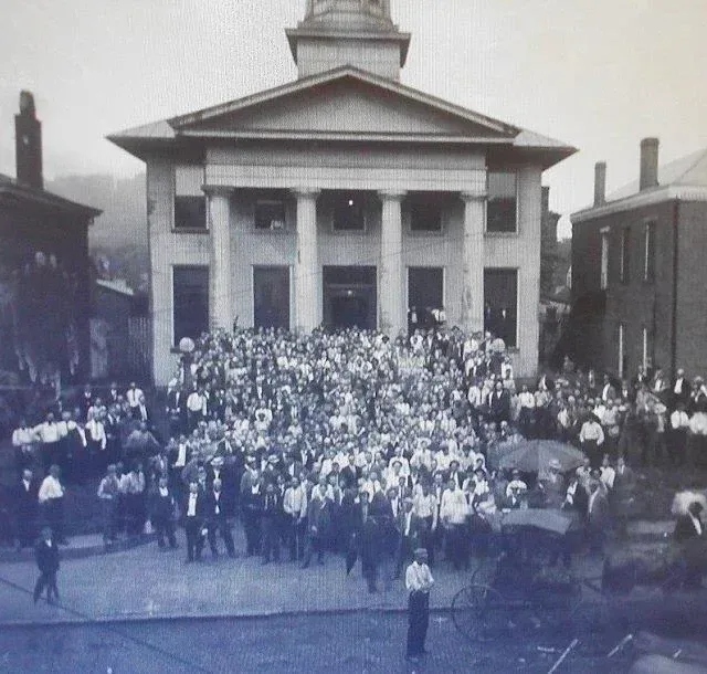 Crowd Fills Courthouse Steps Before Classical Portico, Early 1900s City Street Ceremony