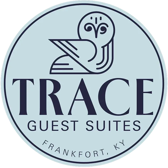 Trace Guest Suites logo with geometric owl, circular badge, TRACE and Frankfort KY text