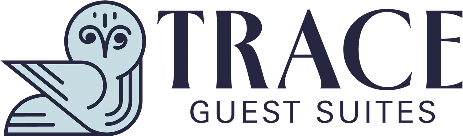 Modern owl logo wordmark for Trace Guest Suites in blue and navy, horizontal branding